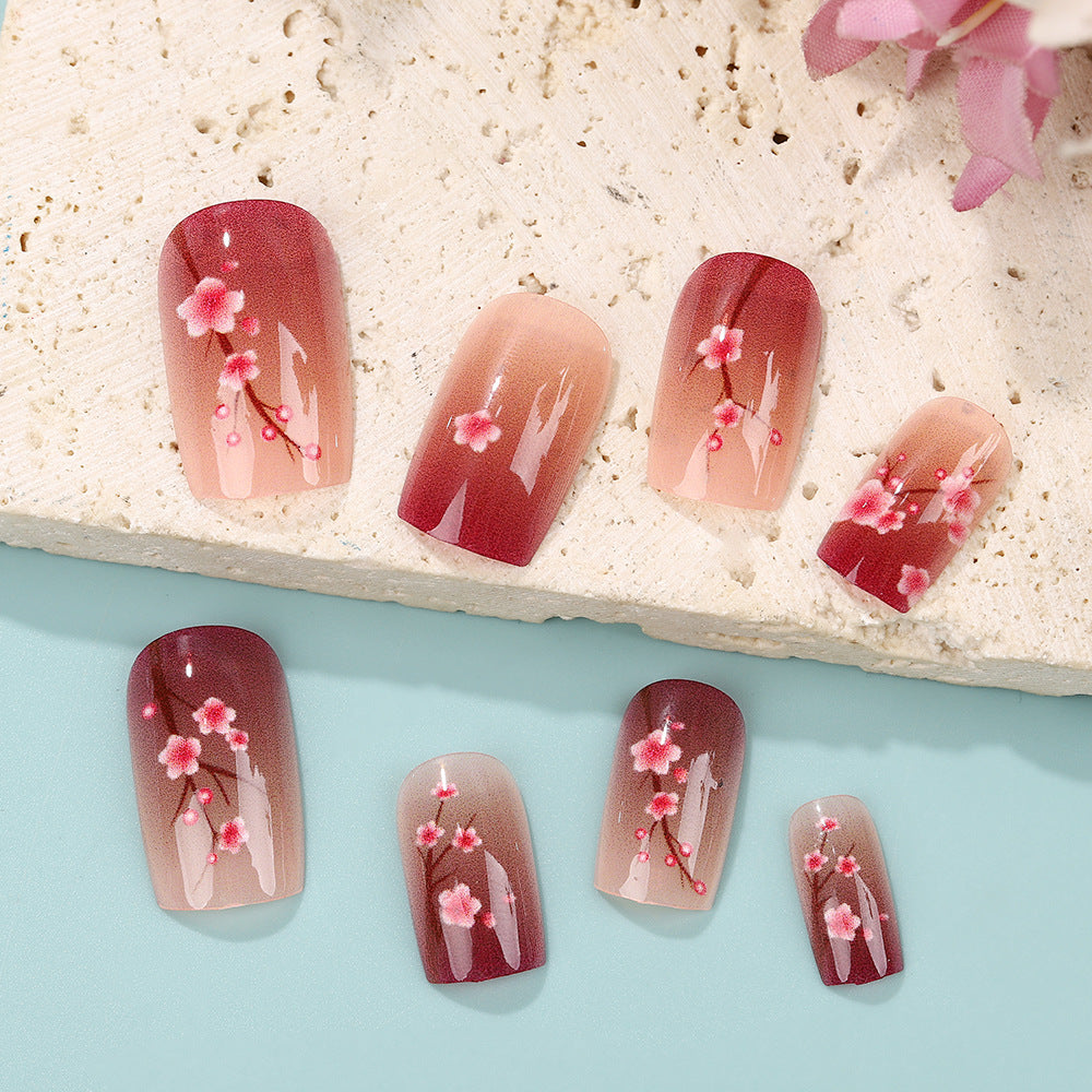 Artificial nails set with floral accents Acalora
