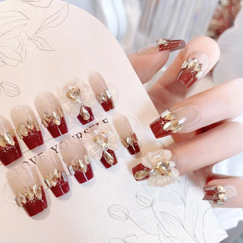 Artificial nails with glamorous floral decorations Acalora