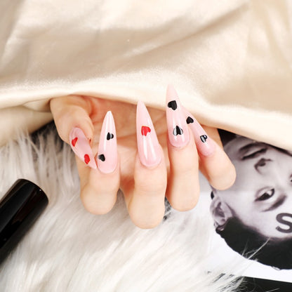 Glamorous artificial nails with heart accents Acalora