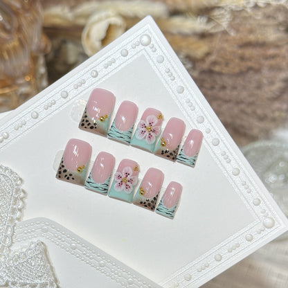 Artistic Press-On Nail Set with Floral and Patterned Design Acalora