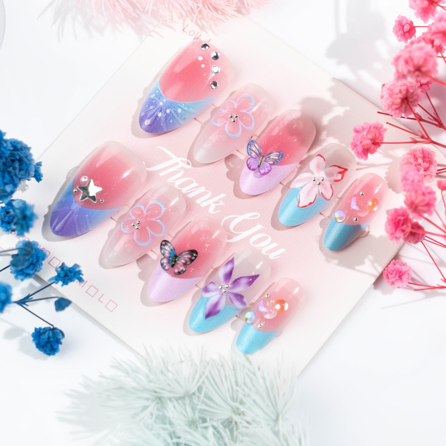 Artificial nail set with floral and butterfly decorations Acalora