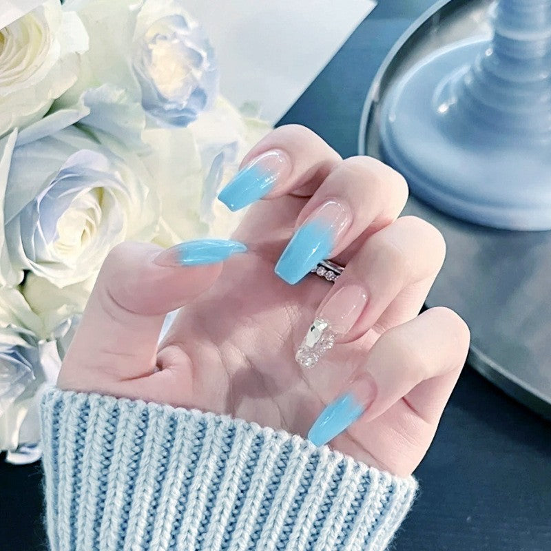 Nail set with elegant ombre and glitter accents Acalora
