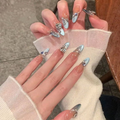 Glamorous artificial nail tips with elegant decorations Acalora