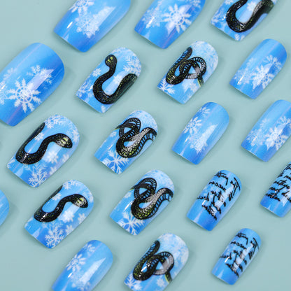 Creative art nails with snowflake and snake motif Acalora