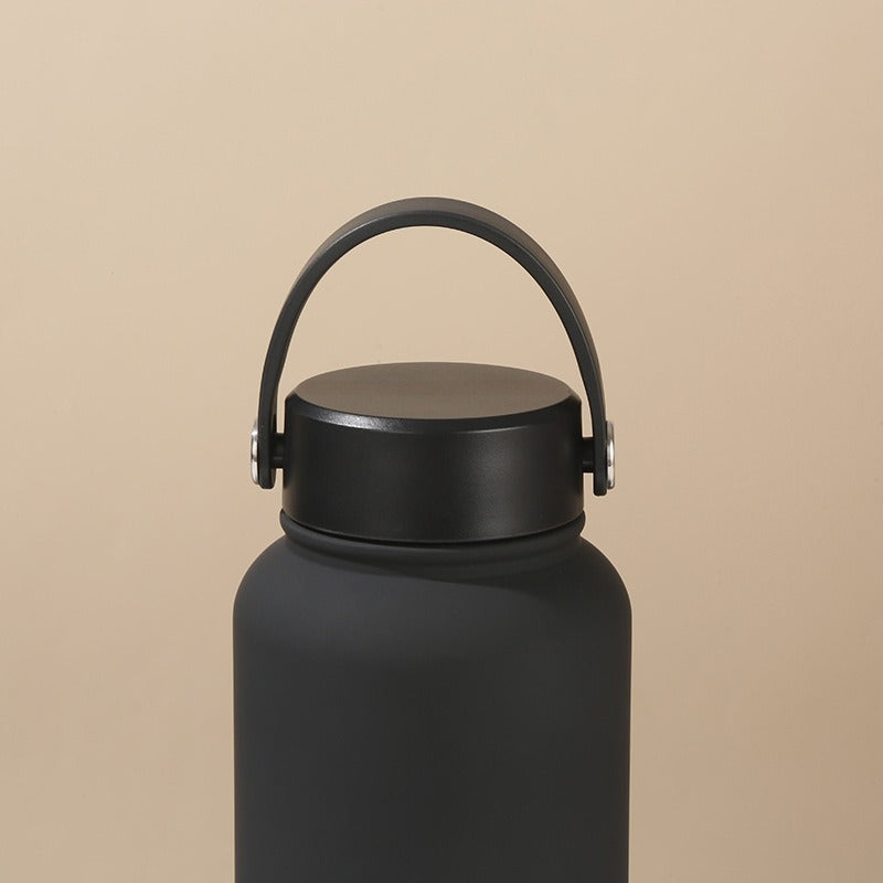 Women's double-walled insulated water bottle with practical carrying handle Kalsten