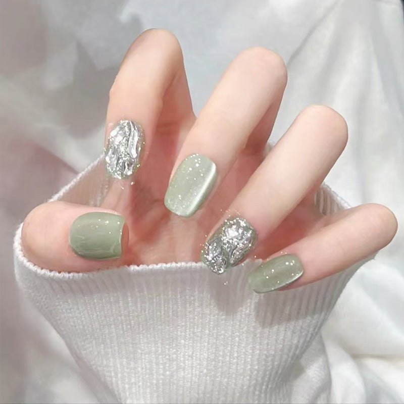 Acrylic nail set with elegant glitter design and creative effects Acalora