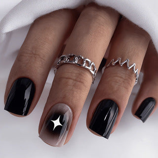 Artificial nails in elegant black with gloss and creative accents Acalora
