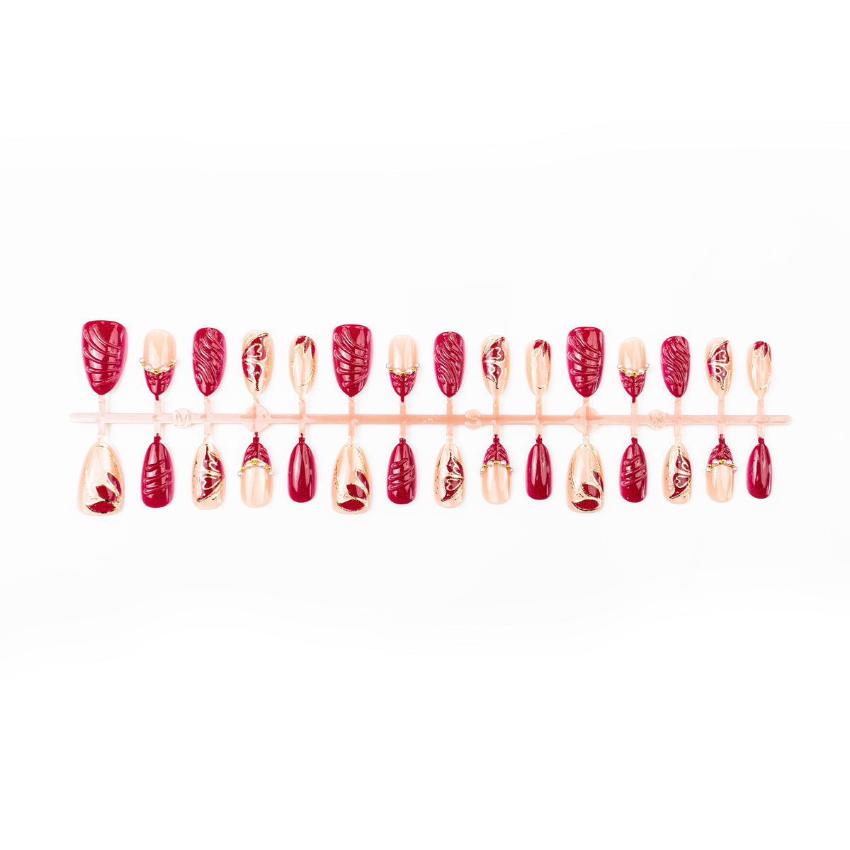 Artificial nail set with filigree golden decorations and romantic heart details Acalora