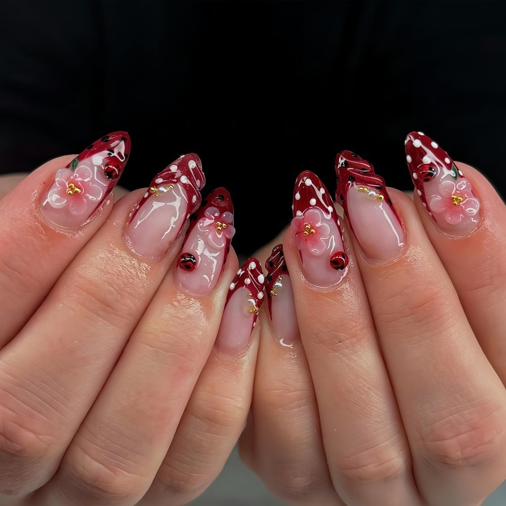 Creative tip design artificial nails with floral accents Acalora