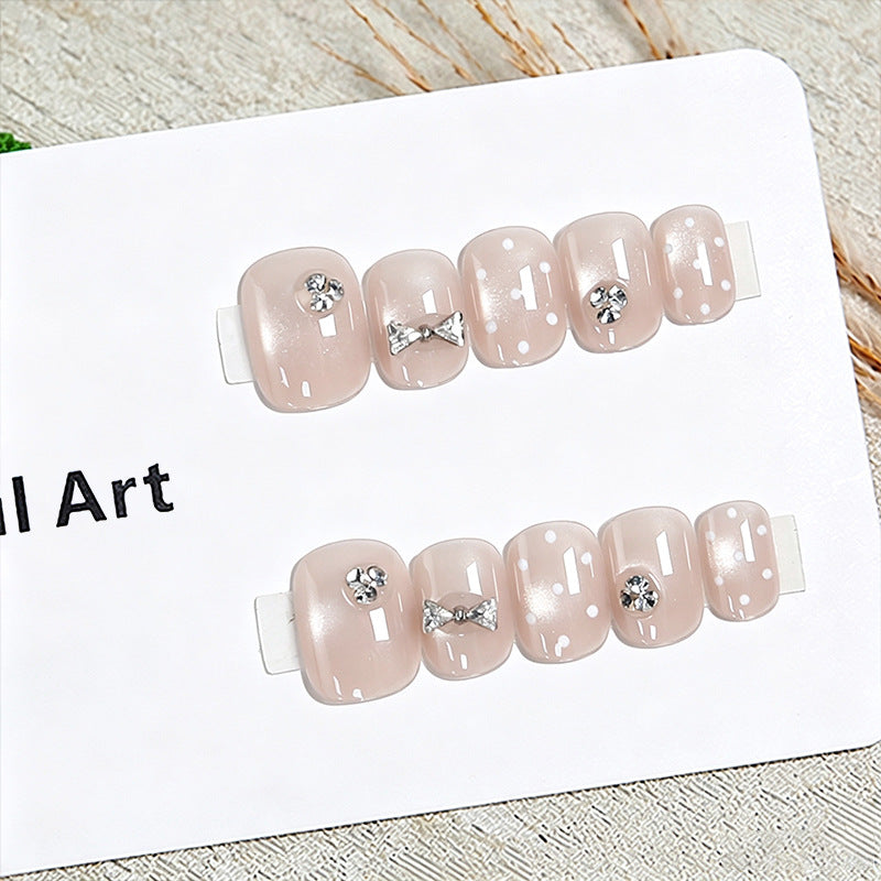Artificial nail set with elegant glitter and crystal decorations Acalora