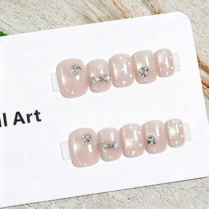 Artificial nail set with elegant glitter and crystal decorations Acalora