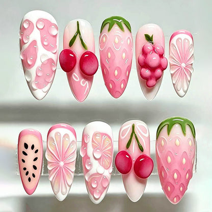 Art nail set with fruity patterns and glamorous accents Acalora