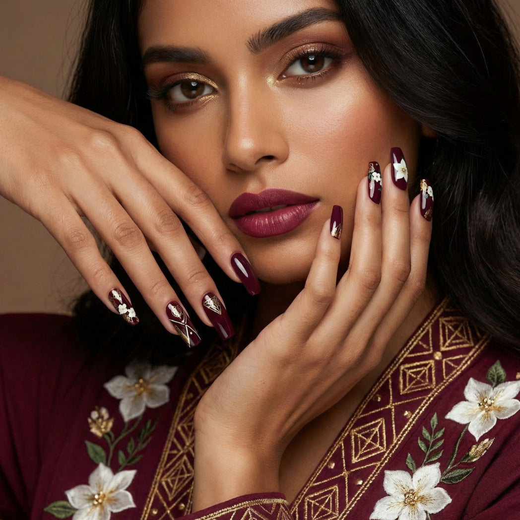 Trendy artificial nails with floral accents Acalora