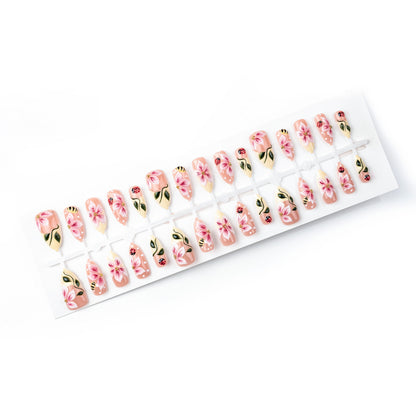 Artificial nail set with floral 3D applications and gloss finish Acalora