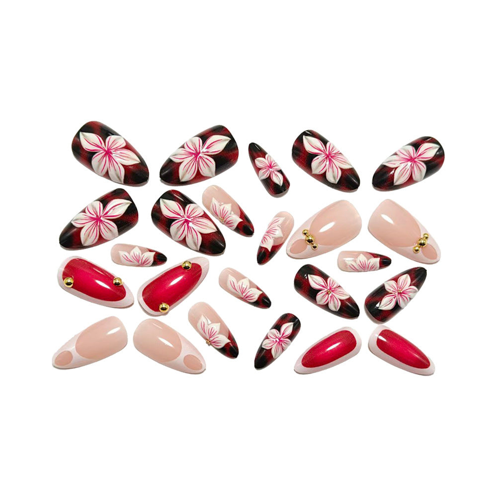 Nail set with elegant floral accents and high gloss finish Acalora