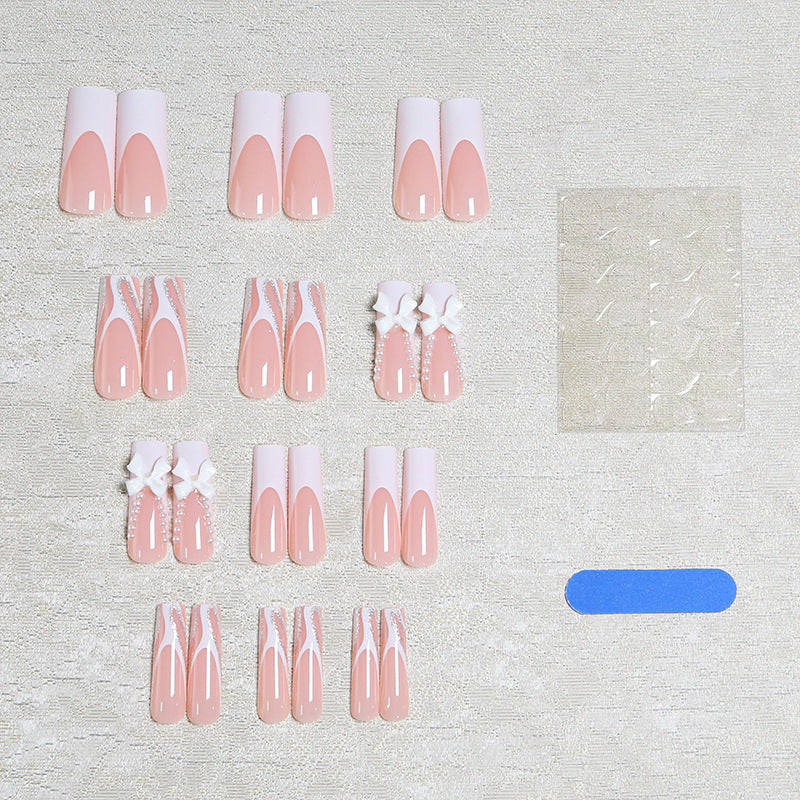Artificial nail set with elegant bow and pearl decorations Acalora
