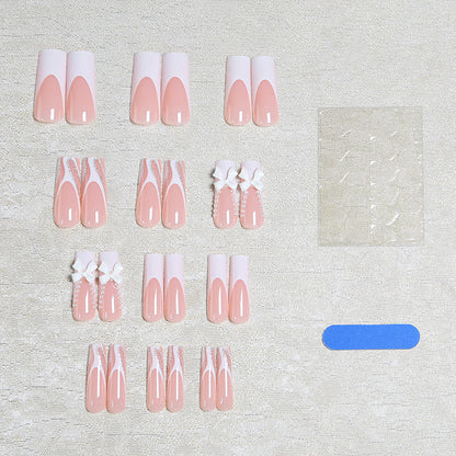 Artificial nail set with elegant bow and pearl decorations Acalora