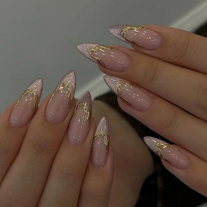 Acrylic nail set with glamorous golden accents Acalora