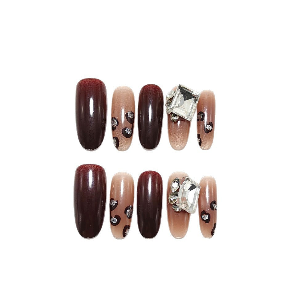 Luxury artificial nails with elegant rhinestone applications Acalora