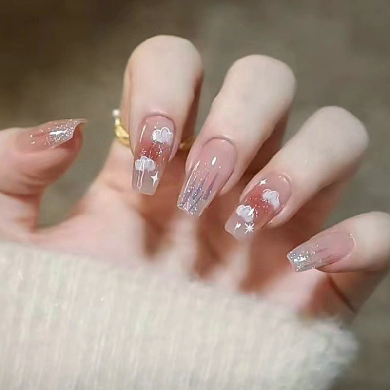 Artificial nail set with floral design and glitter accents Acalora