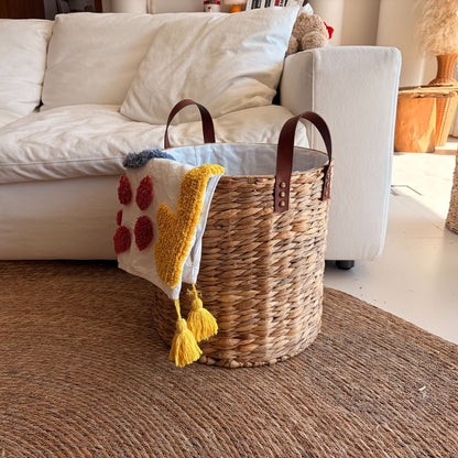 Braided storage basket with leather handles