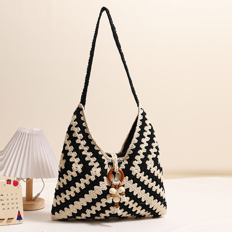 Women's handbag with intricate woven pattern Karnz