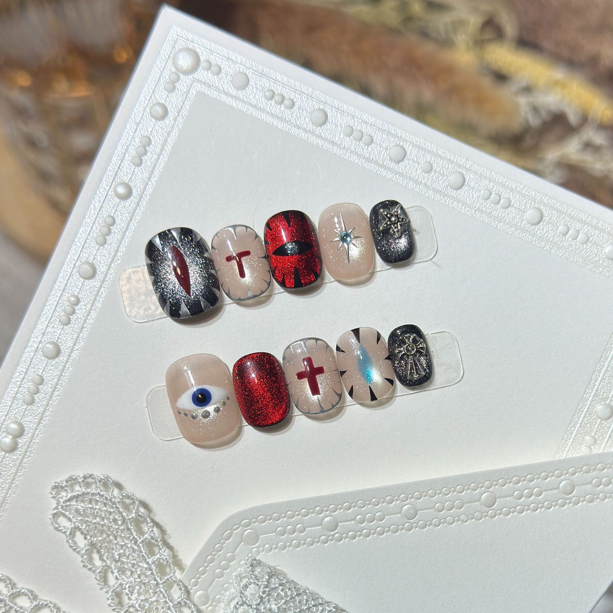 Artistic Press-On Nail Design Set with Unique Symbolic Accents Acalora