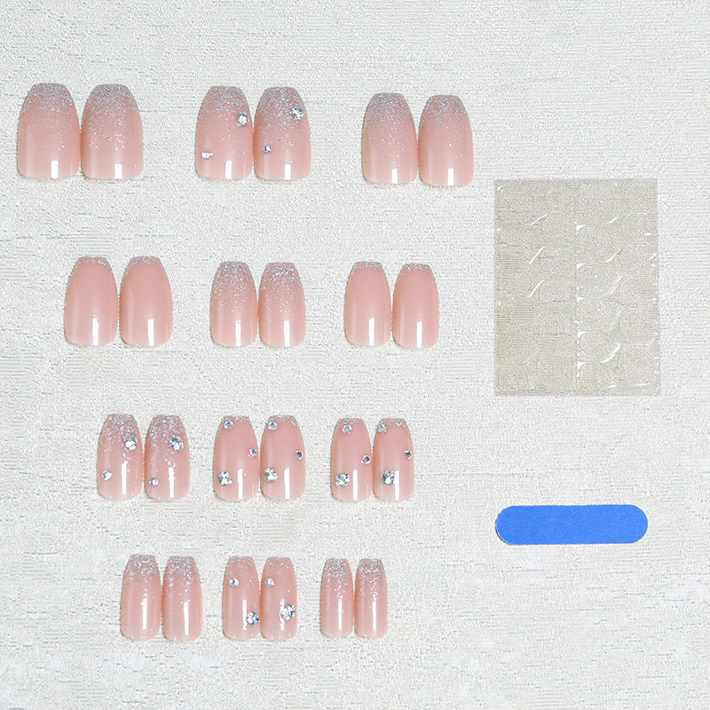 Acrylic nail set with extravagant glitter and crystal embellishments Acalora