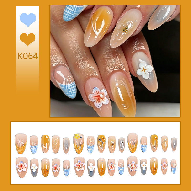 Acrylic nail set with aesthetic floral accents and gloss finish Acalora