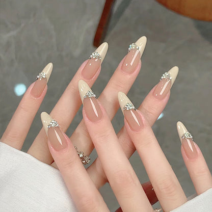 Acrylic nail set with elegant tips and sparkling appliqués Acalora