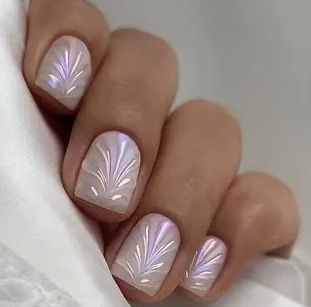Acrylic nail set with elegant pearl details and fine floral patterns Acalora