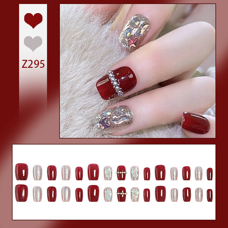 Glamorous artificial nail set with sparkling 3D applications and elegant embellishments Acalora