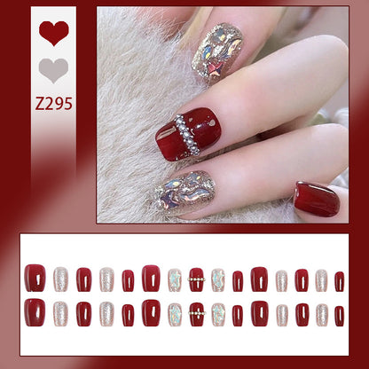 Glamorous artificial nail set with sparkling 3D applications and elegant embellishments Acalora
