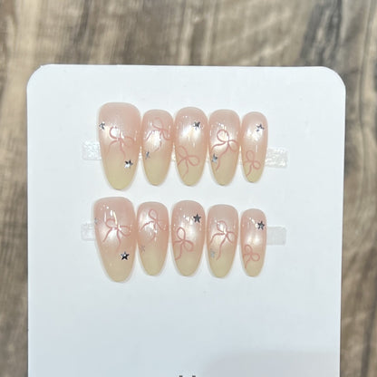 Press-On Nail Set with Bow and Star Accents Acalora