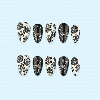 Artificial nails in a unique winter design with snow and reindeer motifs Acalora