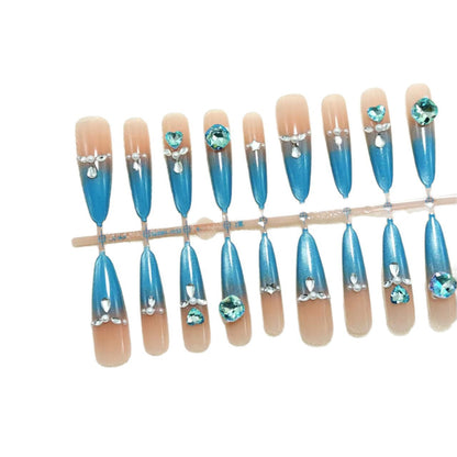 Artificial nails with elegant glitter and stone details Acalora