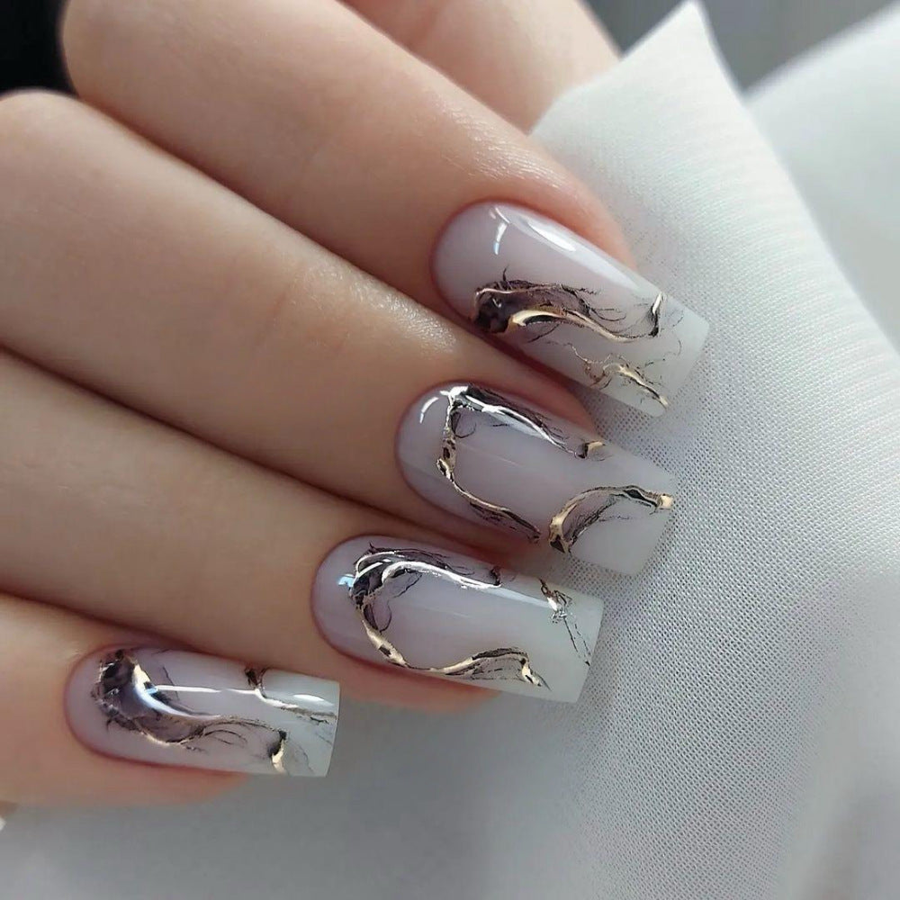 Artificial nails in an elegant minimalist style Acalora