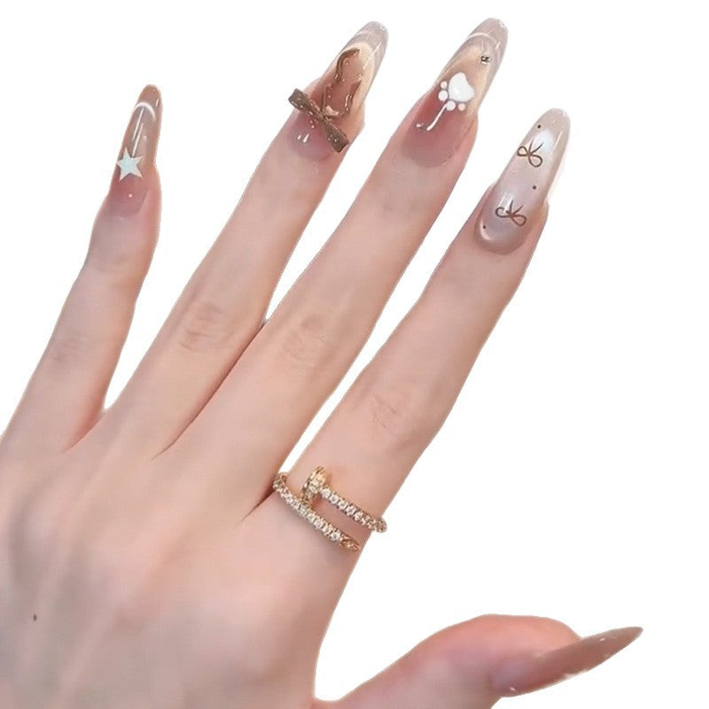 Glamorous artificial nails with creative embellishments Acalora