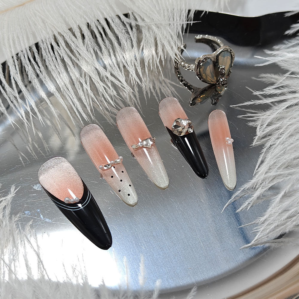 Artificial nails in elegant design with glittering decorations Acalora