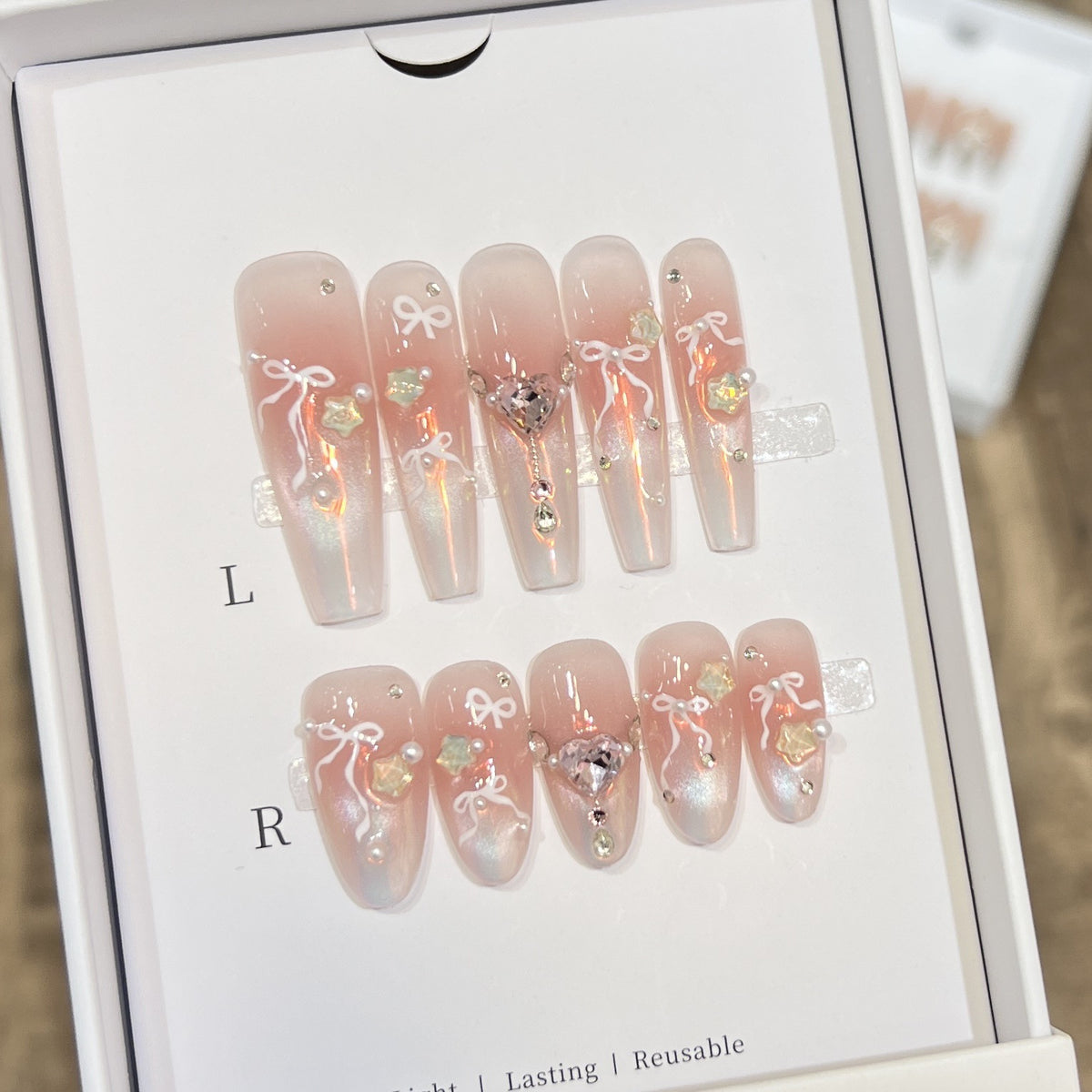 Elegant Press-On Nail Art Set with Chic Ribbon and Gem Accents Acalora