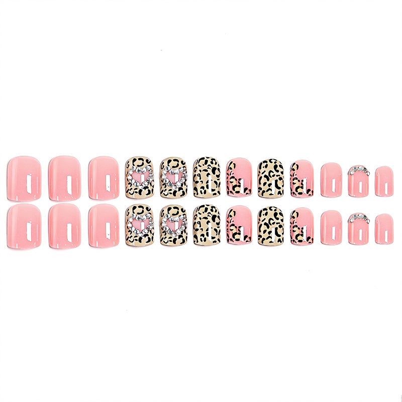 Glamorous artificial nail collection with animal motif and crystal embellishments Acalora