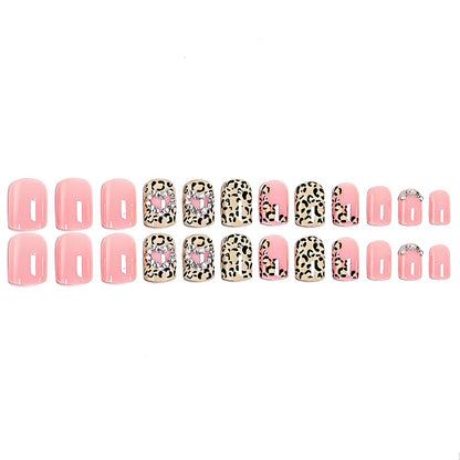 Glamorous artificial nail collection with animal motif and crystal embellishments Acalora