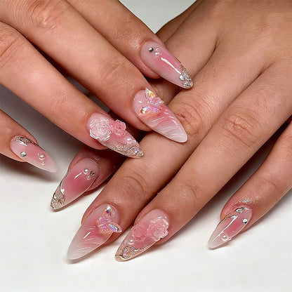 Artificial nail creation with floral 3D details and glitter accents Acalora