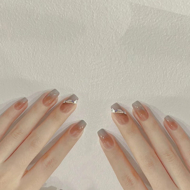 Artificial nail set with elegant ombre design and sparkling applications Acalora