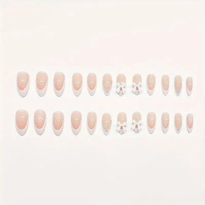 Artistic Press-On Nail Design with Bow Accents Acalora