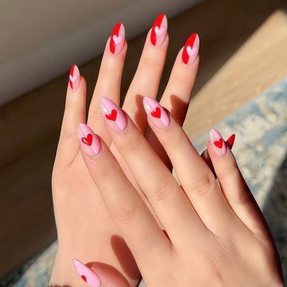 Art nails with romantic heart design Acalora