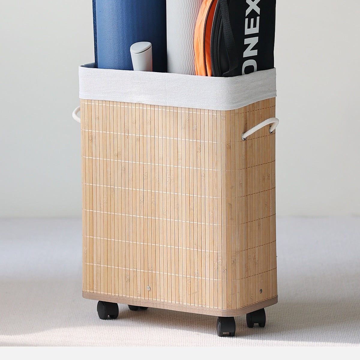 More modern laundry basket with practical movement system Acalora