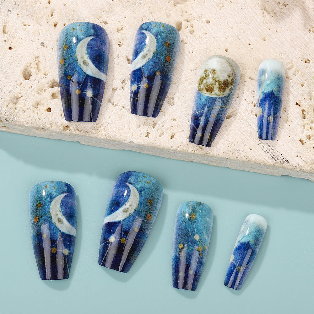 Dreamy artificial nails with moon and star design Acalora
