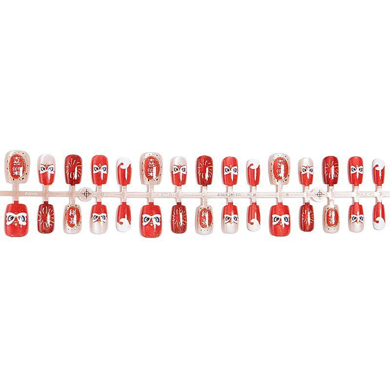 Fake nail set with unique animal motifs and elegant accents Acalora