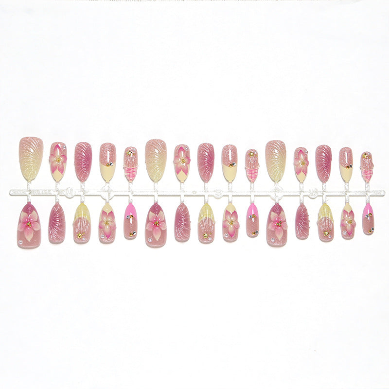 Art nail set with filigree flower decorations and glitter elements Acalora